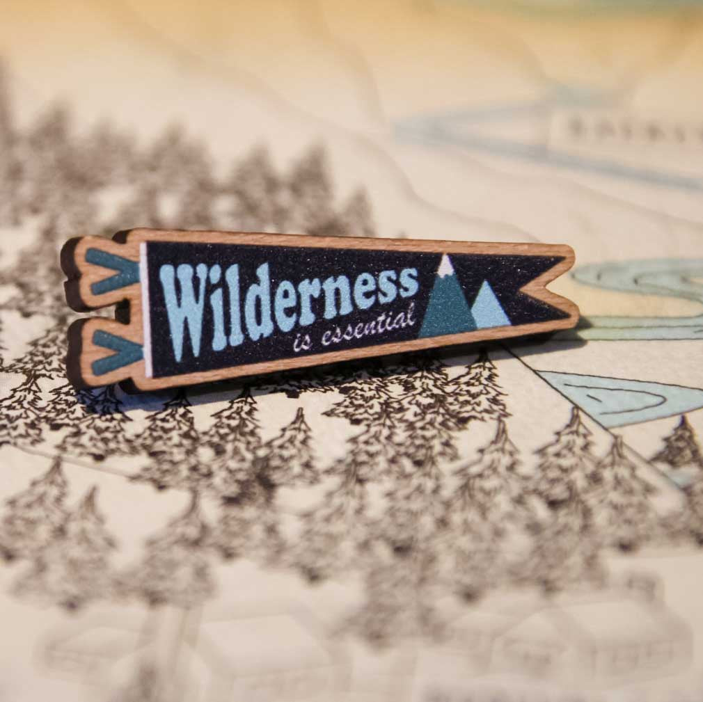 Wilderness is Essential wooden pin (black version)