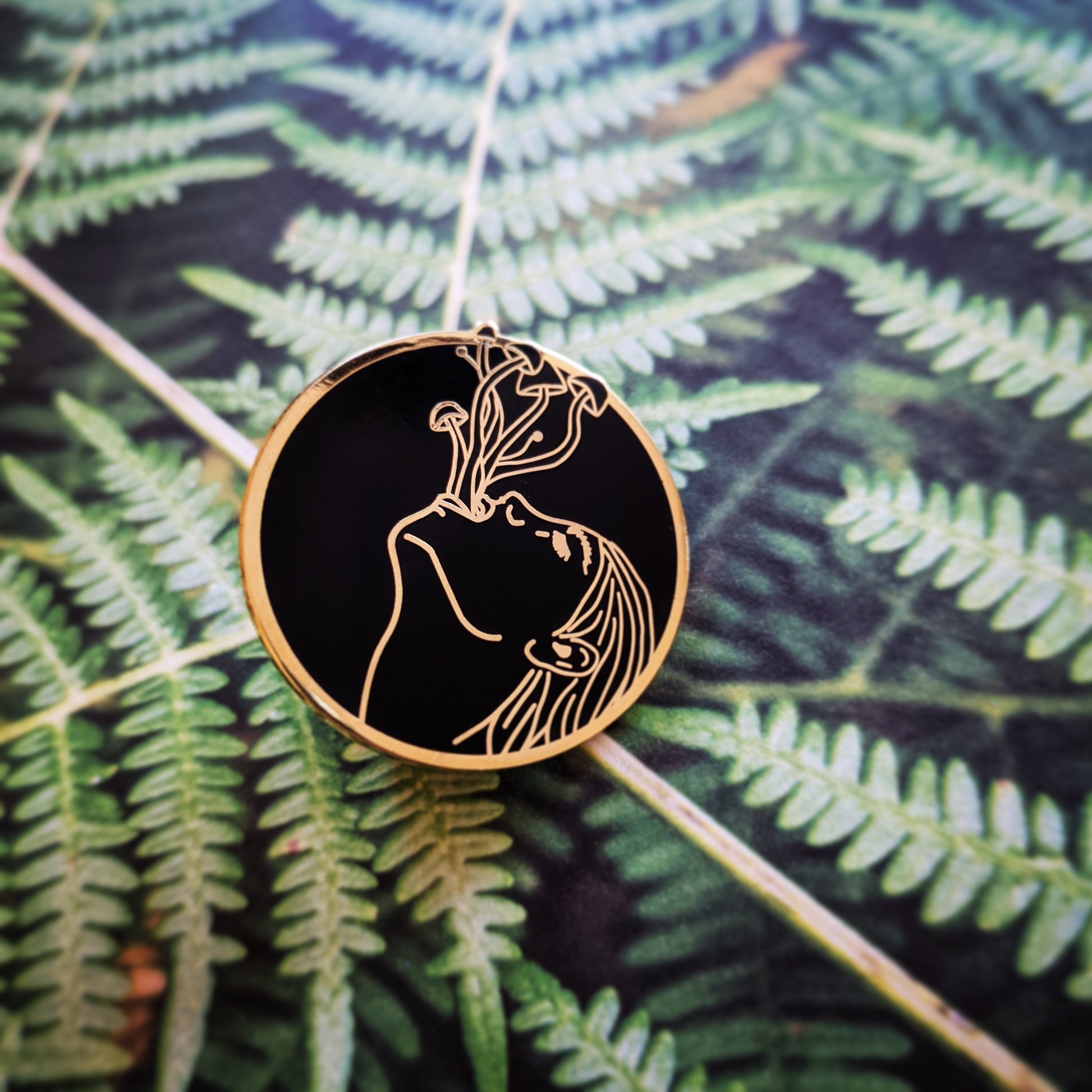 What Grows Inside hard enamel pin (monochrome version)