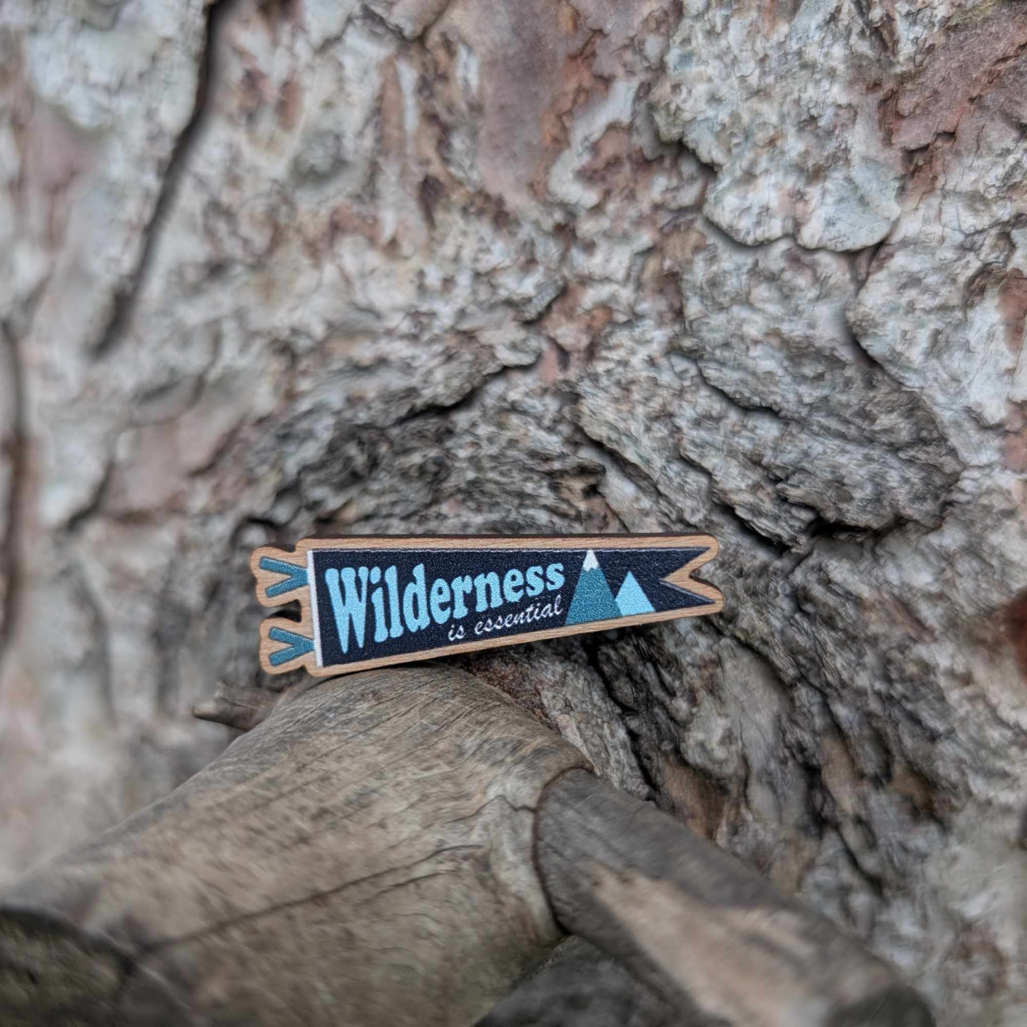 Wilderness is Essential wooden pin (black version)