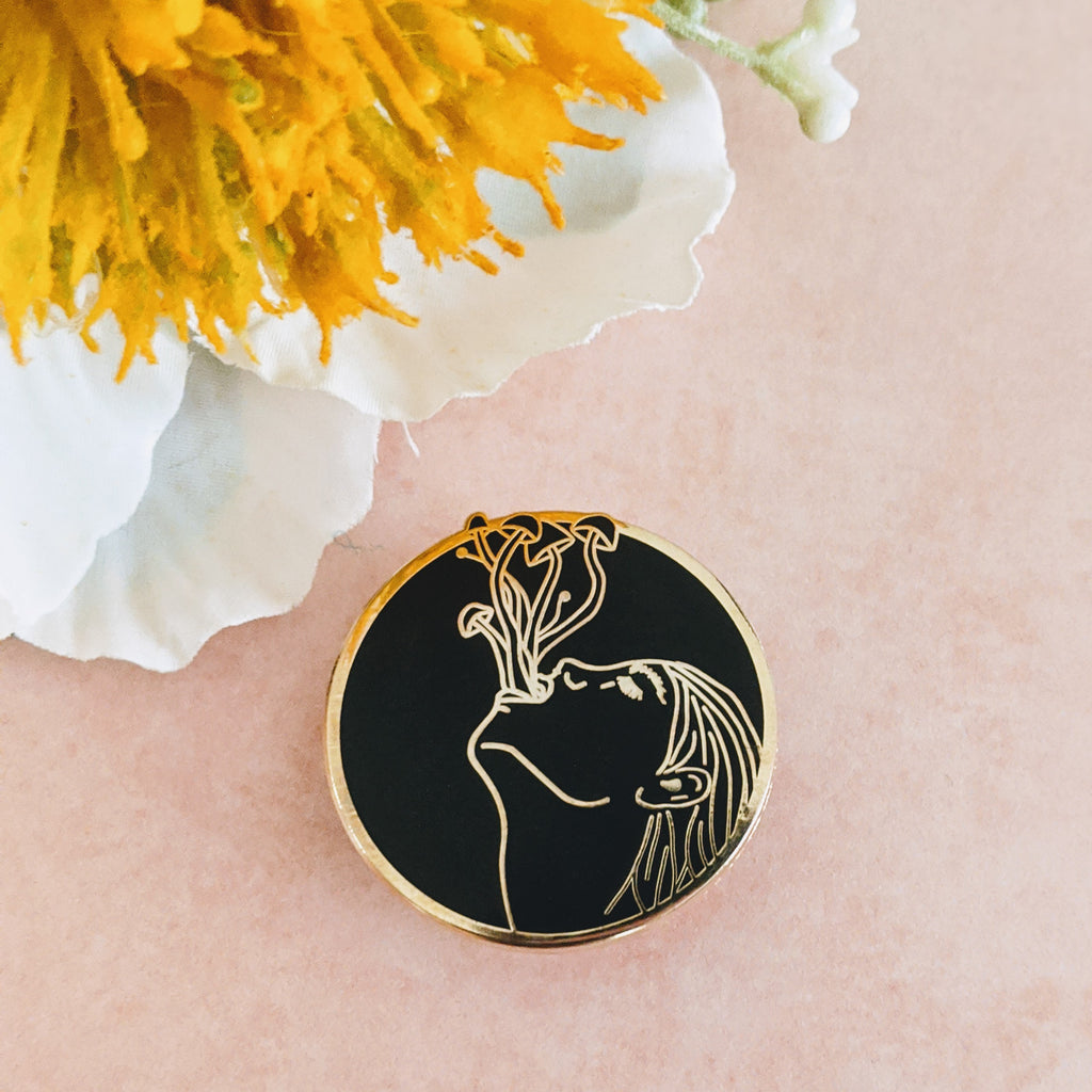 What Grows Inside hard enamel pin (monochrome version)