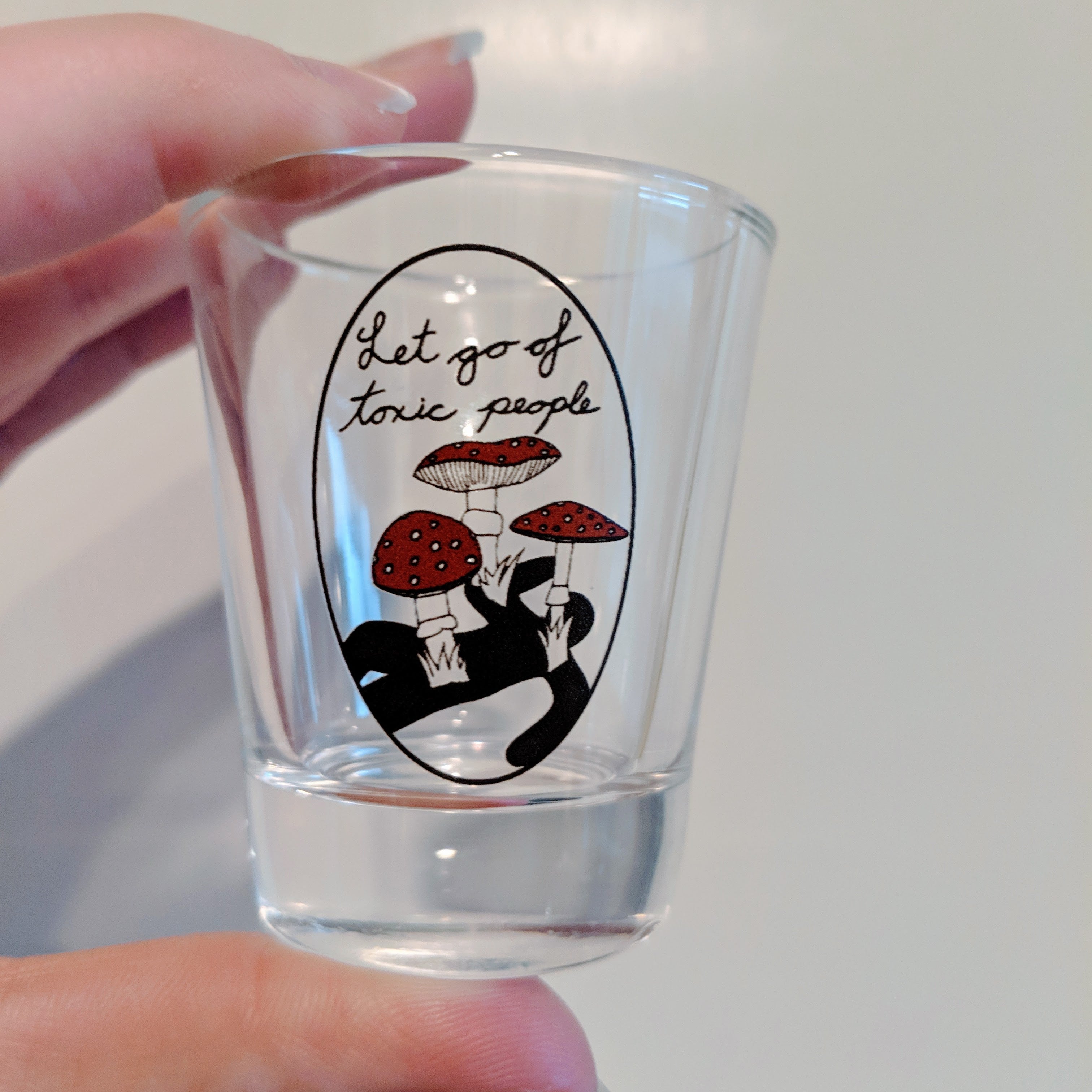 Let Go of Toxic People shot glass