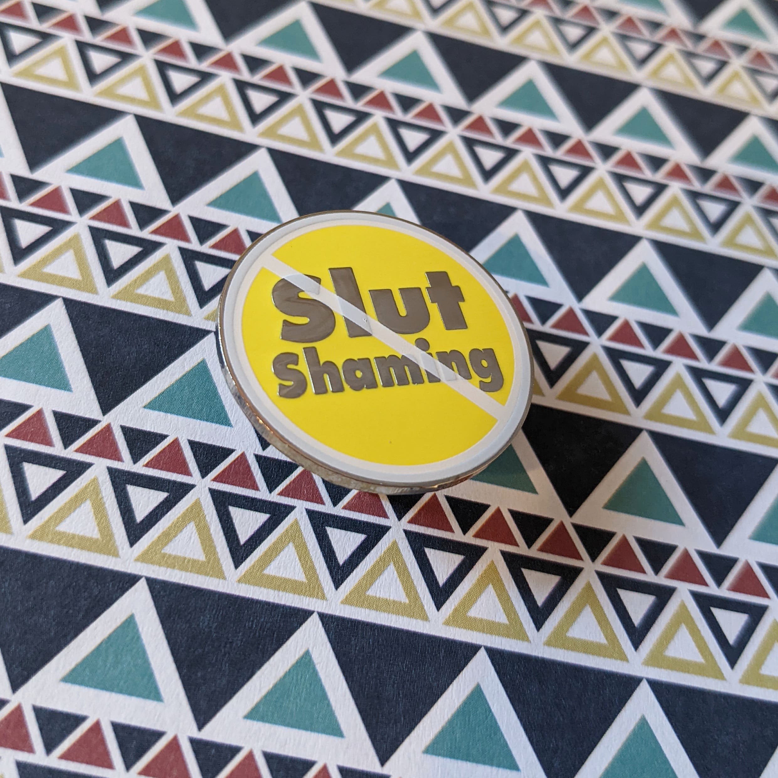 No Slut Shaming hard enamel pin (yellow/silver version)
