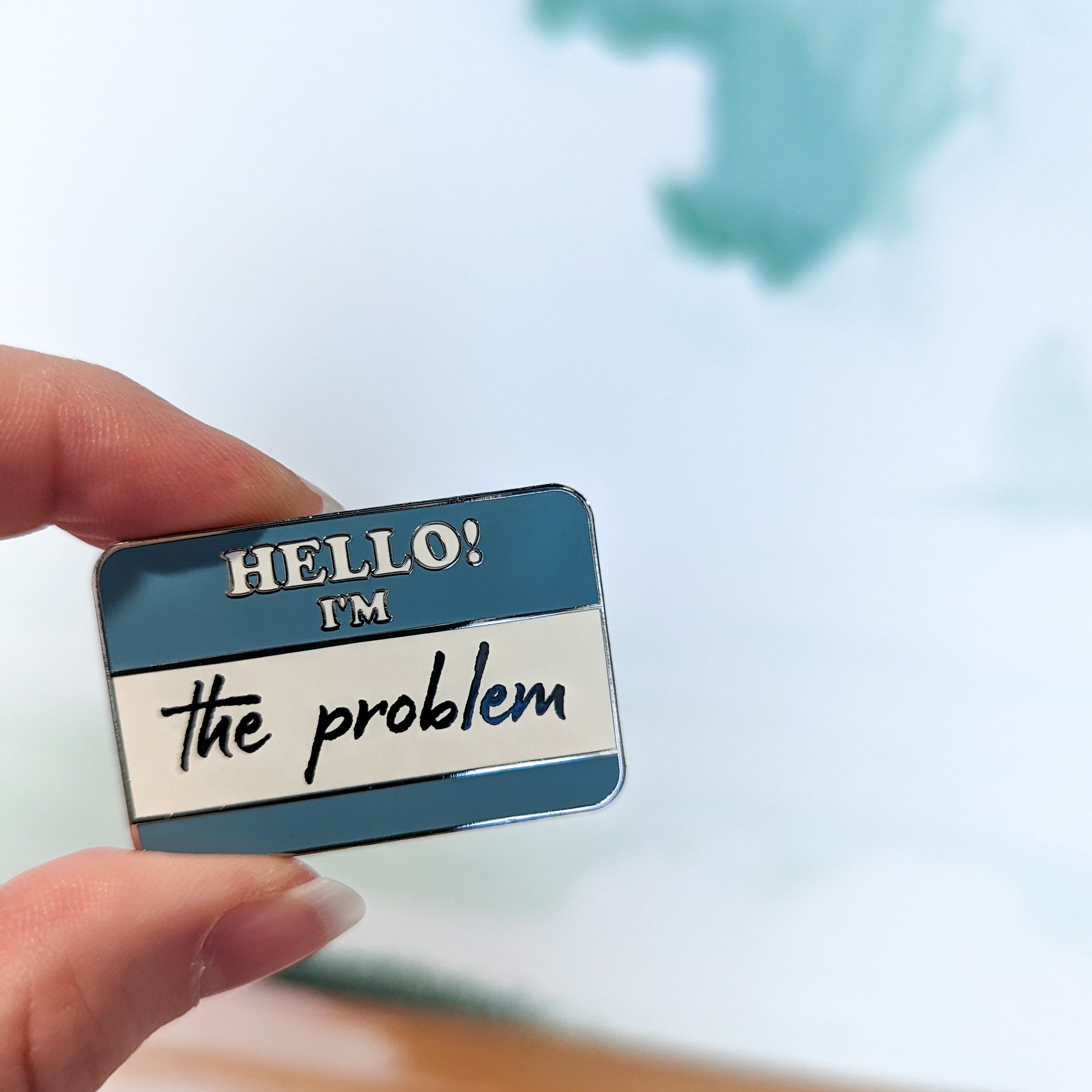 Hello! I'm the Problem hard enamel pin