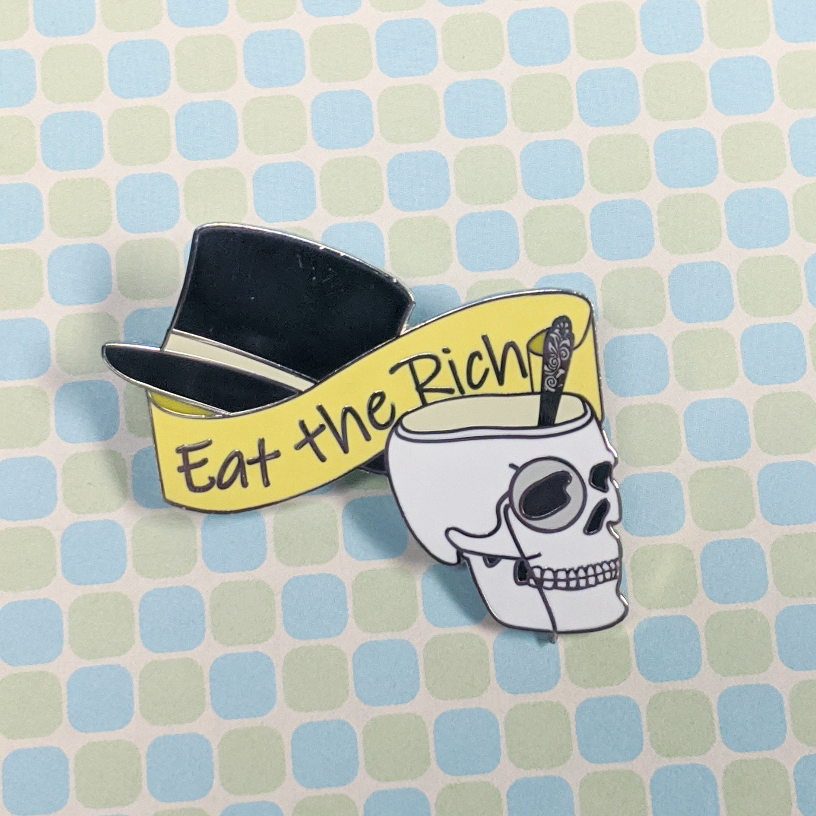 Eat the Capitalists hard enamel pin
