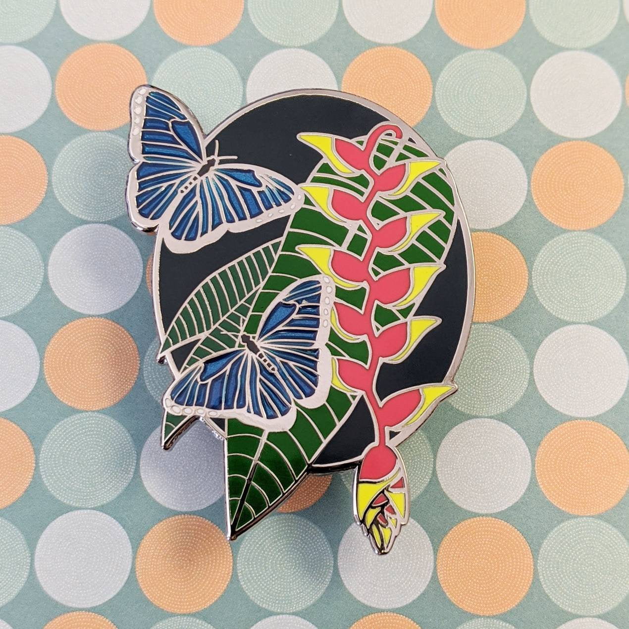 Blue Morpho hard enamel pin benefiting Rainforest Foundation US